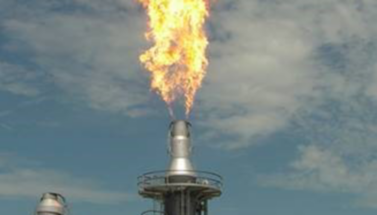 a fire coming out of a tower
